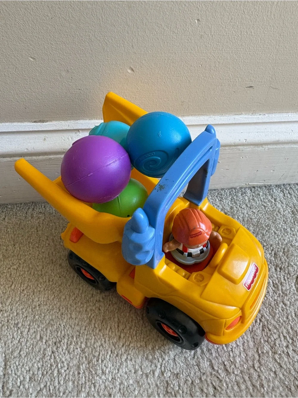 Fisher price little people dump truck with figurine and play balls